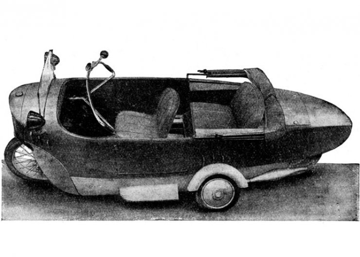 zobrazit detail historického snímku: Dvojkolý automobil továrny Mauserovy se zdviženými opěrnými kolečky.