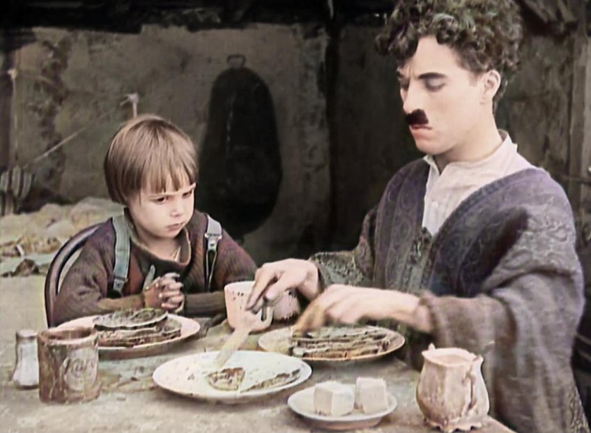 Charlie Chaplin a Jackie Coogan ve filmu Kid. - klikněte pro zobrazení detailu
