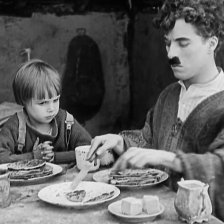 retro fotografie Charlie Chaplin a Jackie Coogan ve filmu Kid.