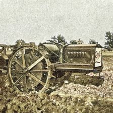 kolorovaná fotografie Českomoravská továrna na stroje Praha, Motorový pluh 32 HP.