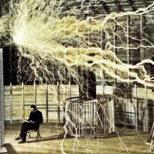 kolorovaná fotografie Nikola Tesla ve své laboratoři.