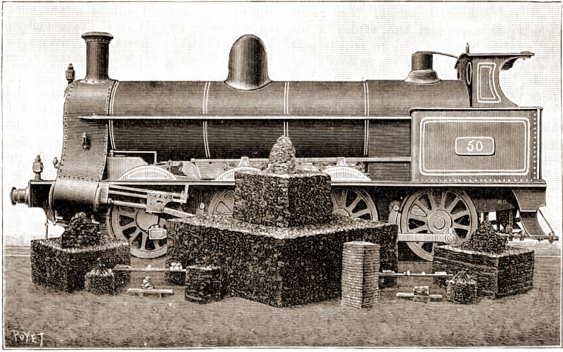 Hotová lokomotiva s narovnanými surovinami, jichž bylo k jejímu dohotovení zapotřebí. - klikněte pro zobrazení detailu