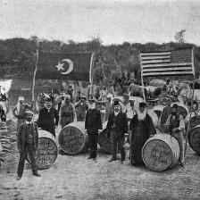 retro fotografie Američtí obchodníci s pravou vodou jordánskou pod dozorem úředníků tureckých.