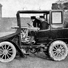 retro fotografie Wolsleyův dělový automobil.